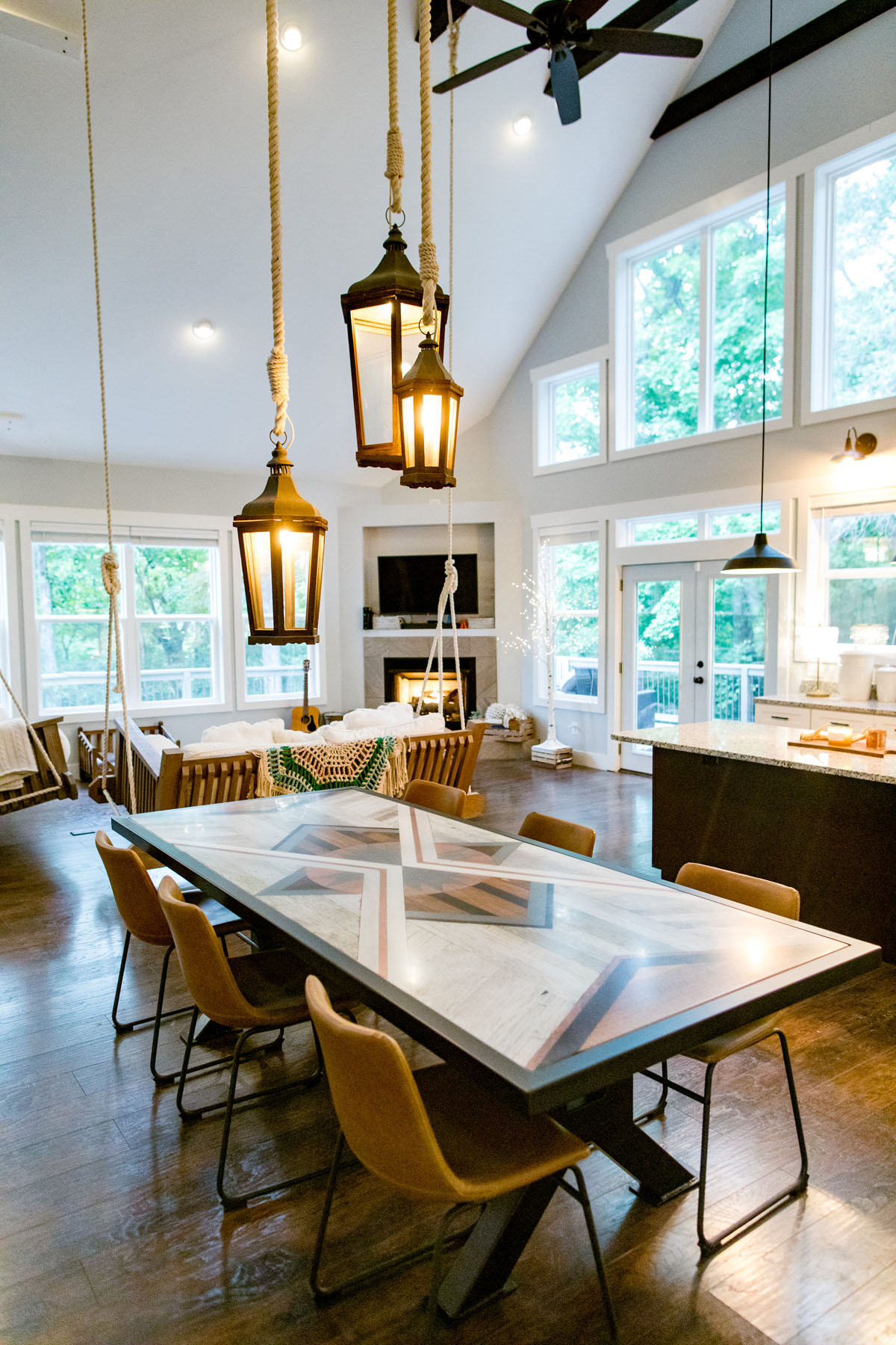 Tennessee Light House living room, white walls, brown wood floor, large windows with natural light